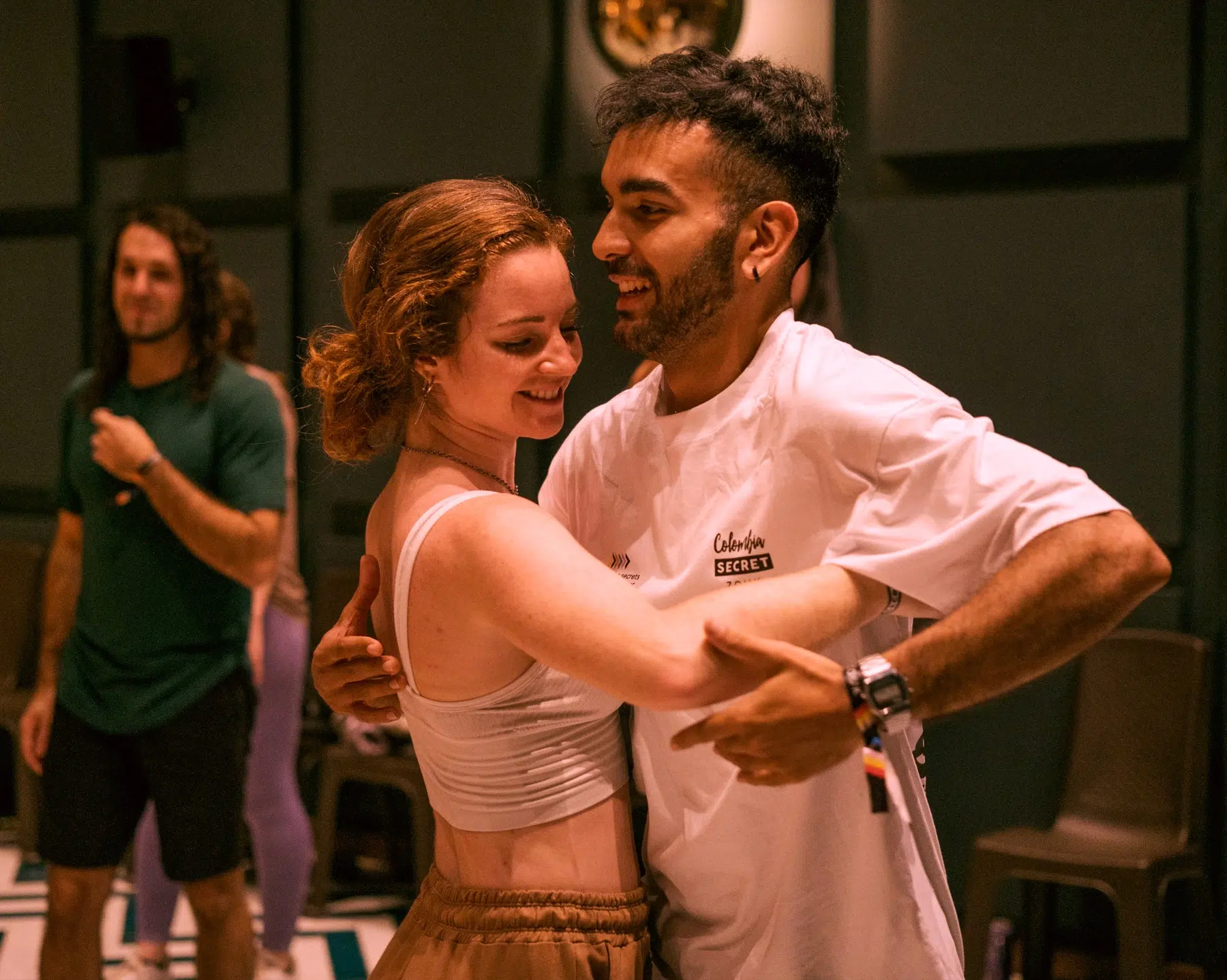A couple practicing partner dance together