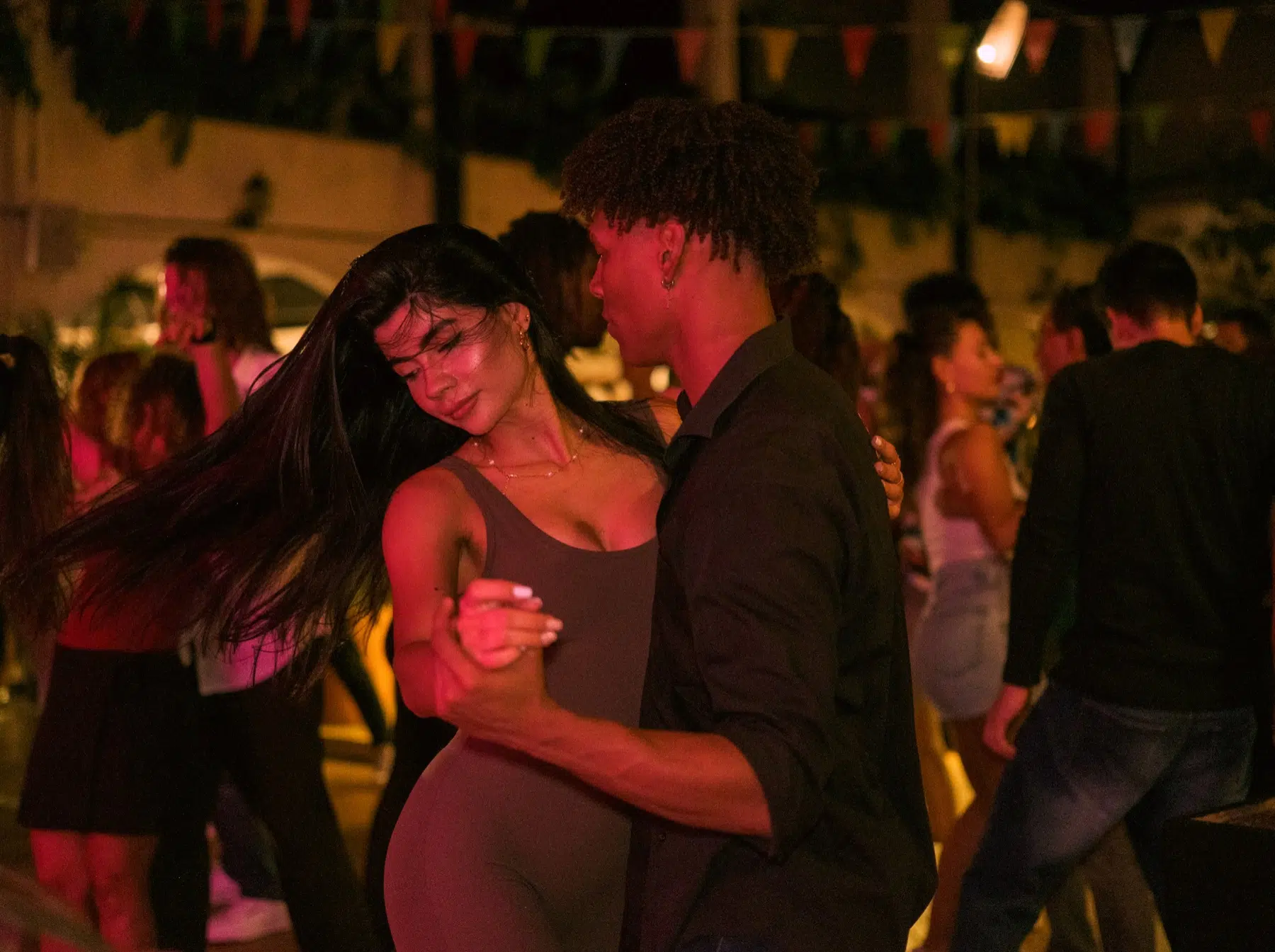 Dancers sharing a bachata moment in Medellín